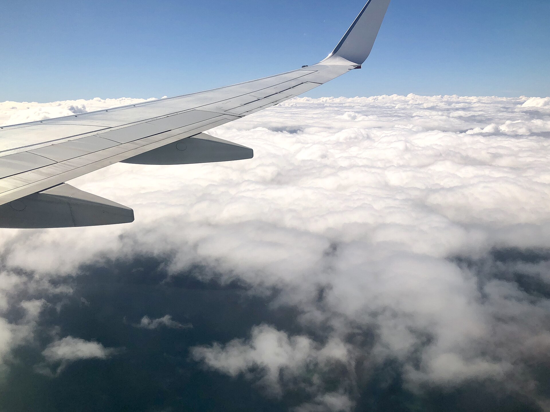 aircraft window clouds